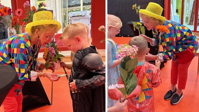 Juf Grietje krijgt bloemen en persoonlijke boodschappen van de kinderen.