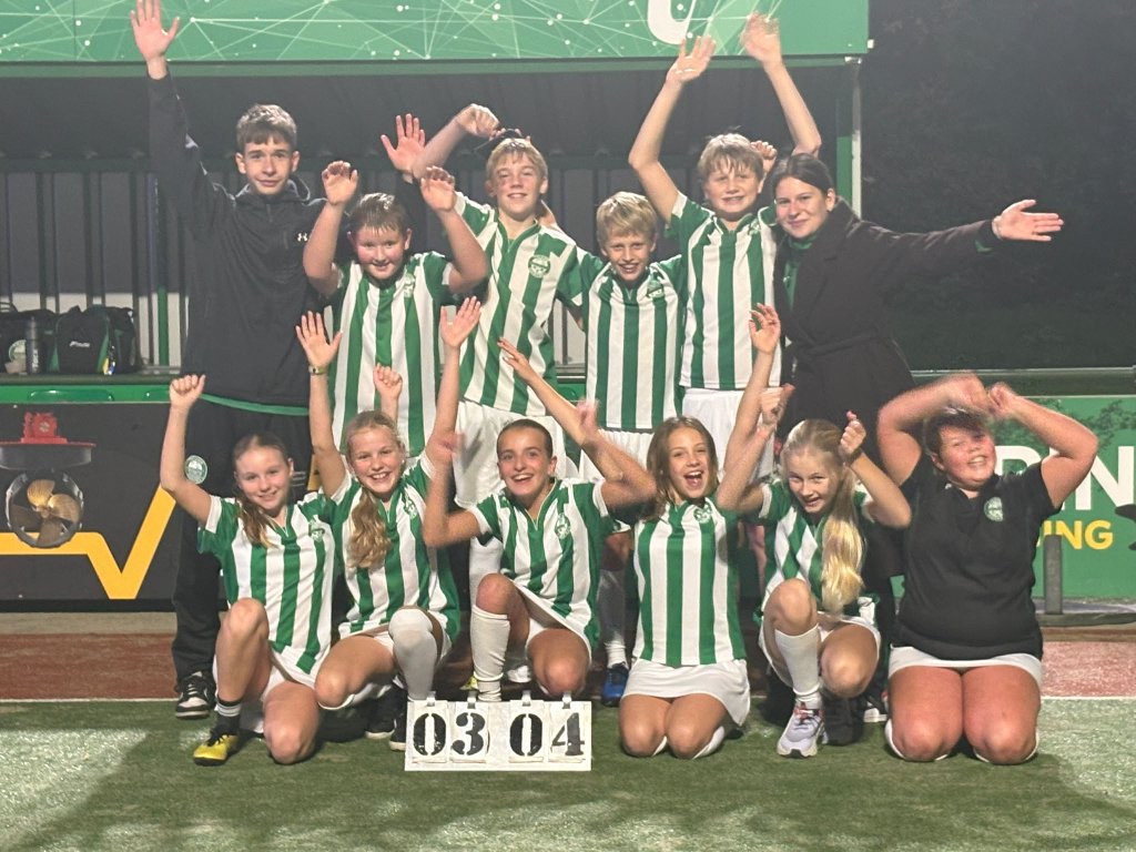 Het kampioensteam van Triade J3.