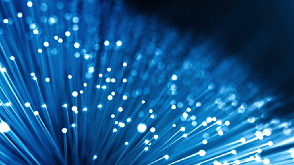 Seamlessly loopable tracking shot, perfectly usable for content related to fiber optic cables or as an abstract background for topics like data transfer or global communications.