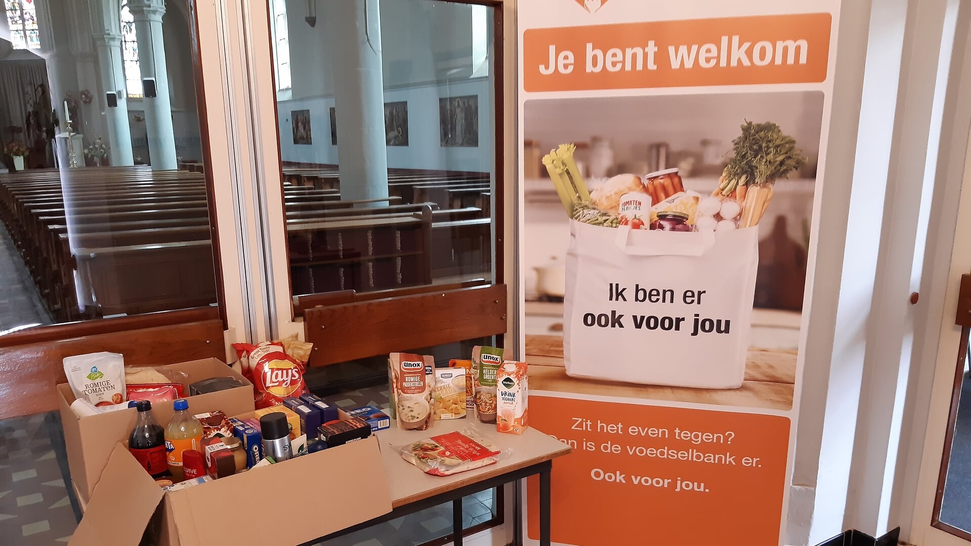 Actie RK kerk in Cothen voor Voedselbank levert twee volle dozen op